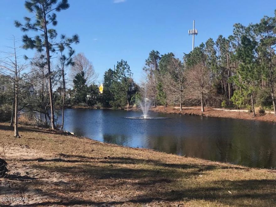 Beautiful lot & a half with waterview in the Martinique Subdivision! This gorgeous over-sized lot is completely cleared and ready to build on. It is conveniently located right across from the community pool, play ground area and mailboxes. The backyard backs up to one of the nice community lakes. This lot also has ARB Approved Builders Plans, the ARB Approved Landscaping Plans and Survey that are included. That's over a $15,000 value and will also save several months on your building time by not waiting for the approval process!! This is a rare opportunity to build a beautiful home on an over-sized lot in this gated community. Drive by to see it today!!
