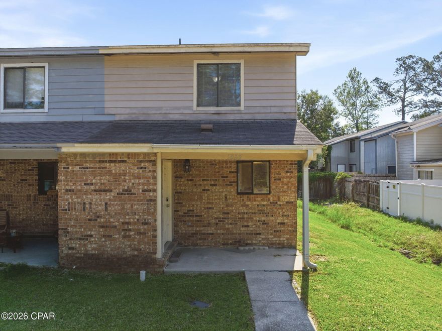 Move right into this well-maintained 2-bedroom, 1.5-bath end-unit townhome--ready for immediate occupancy. Centrally located in Fort Walton Beach, you'll enjoy easy access to Eglin Air Force Base, Hurlburt Field, and a convenient walk to Northwest Florida State College.  

Inside, you'll find a bright and functional layout with durable wood-look tile throughout the main living areas, an updated kitchen with ample cabinetry, and comfortable carpeting in the upstairs bedrooms. The spacious living area opens to the backyard through sliding glass doors, bringing in natural light and creating an easy indoor-outdoor flow.

Updated bathrooms feature modern fixtures, refreshed vanities, and a clean, contemporary look that adds to the home's move-in ready appeal. Storage is a standout feature, with a generously sized primary bedroom closet and extra storage space in the upstairs bathroom to keep everything organized.

What truly sets this home apart is the end-unit position, offering an oversized side yard and backyard--fully fenced for added privacy and perfect for pets, entertaining, or simply enjoying your outdoor space.

Additional highlights include a covered front entry, spacious laundry room, and all appliances--including the washer, dryer and refrigerator--convey with the sale. 

No HOA fees keeps monthly costs down and offers added flexibility for homeowners or investors.

Whether you're looking for a primary residence, rental investment, or a low-maintenance home close to the bases and local amenities, this property checks all the boxes.