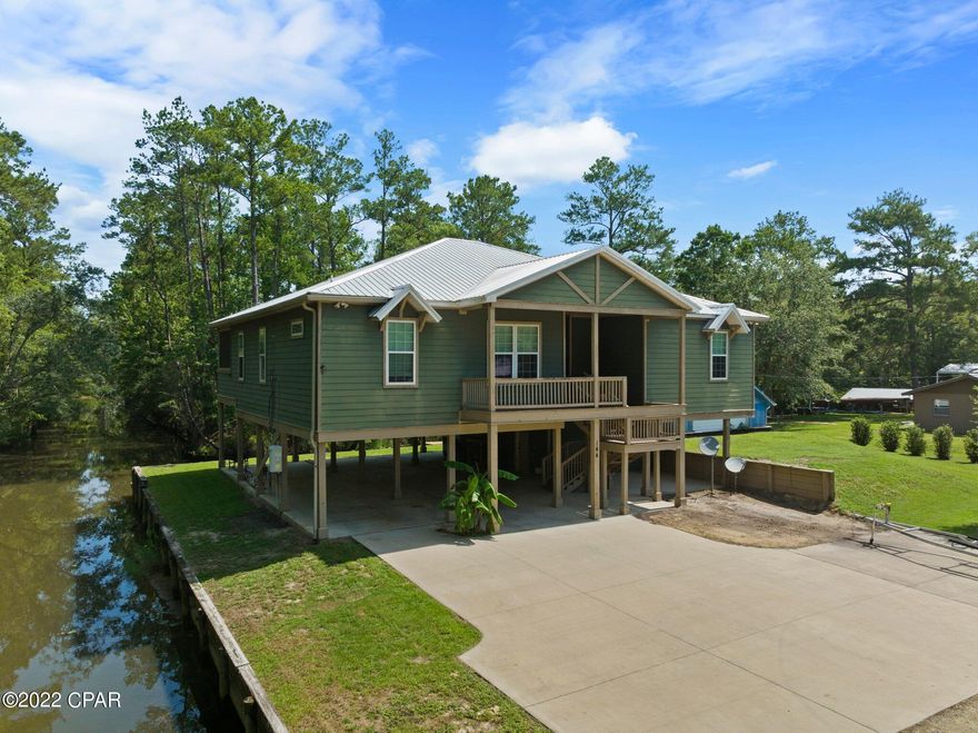 Your private oasis awaits... Relaxation, adventure, and abundant wildlife reside here- yes, you can have it all! Situated on the corner of the canal with 266' of waterfront, this home is located right in the heart of the Choctawhatchee River with easy access to the Choctawhatchee Bay and the fresh water springs to the North. This custom built home includes all the features you want: split floor plan, elevator, screened in summer kitchen, private deep well, Generac generator, hardwired security system, private boat dock, and a plethora of cabinets and kitchen storage including hall pantry. This home is a must see! Buyer to verify all information and measurements deemed important.