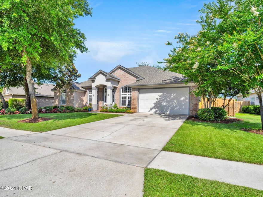 Nestled on a beautiful waterfront lot, this meticulously updated 4-bedroom, 3-bathroom home offers a serene escape in a backyard that feels like your own personal park. The spacious 10-foot ceilings and elegant moldings throughout the house, combined with the addition of shiplap in four rooms, create a modern and charming ambiance. The kitchen features brand-new cabinets, luxurious quartz countertops, and state-of-the-art appliances. The pantry offers ample storage, while the movable island in the eat-in kitchen area adds versatility and charm. The laundry room has been maximized for storage and efficiency. The garage includes built-in cabinets, pull-down stairs, and floored attic space, providing plenty of storage. Key updates include a new HVAC system, a new roof, and new water heater and new fence.
Outdoor living is a dream with a large screened-in porch and an expansive paver patio, perfect for entertaining or simply enjoying the peaceful surroundings. The park-like backyard is complemented by a shed, ideal for storing outdoor toys and equipment.