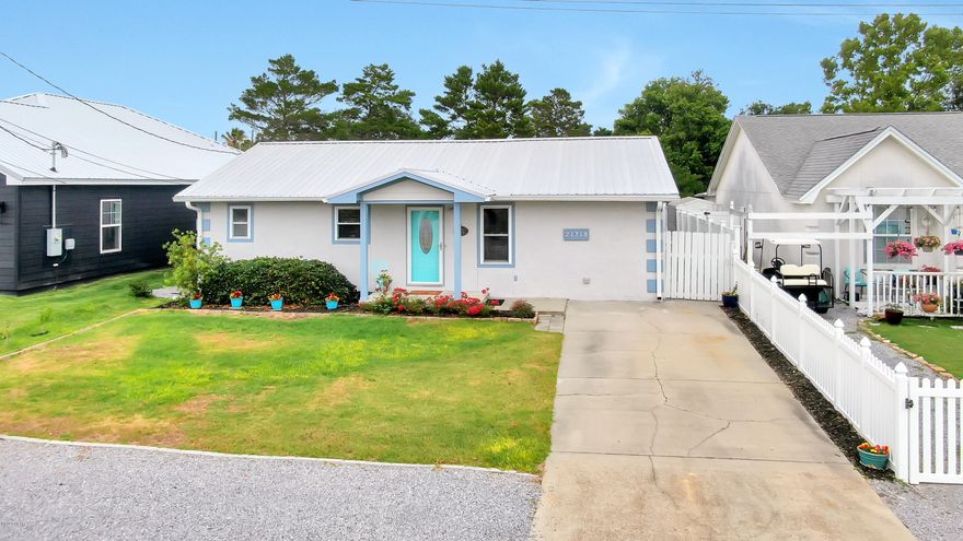 Cute, updated Beach House just a few blocks to the Beach and NO HOA to pay!! Well maintained, and deceptively spacious beach house ideal for primary residence, second home or Vacation Rental property. Located in the Golf Cart friendly neighborhood of Riviera Beach on the magnificent West End of PCB, a few minutes from HWY 30-A to the West & Pier Park to the East. This property features a split bedroom floor plan with 3 bedrooms and 3 full bathrooms, large open kitchen/living room/dining area, a second living room/office plus an enclosed Sun Room. Updated Kitchen features Stainless Steel appliances all new in 2019, Granite Counter tops plus huge 5 ft square Granite Island with lots of extra cabinets. Ceramic tile floor throughout, Stucco exterior, Metal Roof, impact resistant Low E windows. Fully Fenced Back yard with sprinkler system, Outdoor Shower, 12 x 16' Workshop with workbench and electric plus additional storage shed. Call Today!! All measurements are approximate. Buyer to verify all measurements if important.