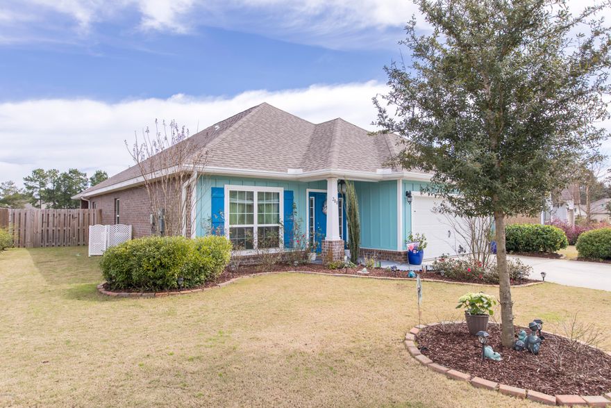 Seller MOTIVATED! Get a paint allowance or home warranty! This residence features nearly $20,000 worth of upgrades

including gutters, extended patio, fenced in backyard, new paint, gorgeous chandeliers, custom tile backsplash that includes under cabinet lighting, large custom Kitchen Island to match granite counters, as well as shelving throughout the garage! Wow, this large lot has great views overlooking the lake, complete with gorgeous landscape additions! This Bailey home design comes with a handsome brick/hardy board exterior, 2-car garage, irrigation/well system, hurricane shutters, matching stainless appliances & gorgeous open floor plan. Back door leads to a relaxing garden oasis & patio retreat! Enjoy relaxing lake views from the kitchen,living room(more