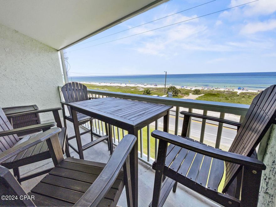 CURRENTLY UNDER CONTRACT, SELLER WILL CONSIDER BACKUP OFFERS.  Great low-rise condo located in Laguna Beach with amazing unobstructed Gulf Views, located on the West end of Panama City Beach.  This condo is steps across to the white sandy beaches and located near many shops and restaurants, with Carousel Grocery next door, 4 miles to Pier Park, and 6 miles to upscale dining and shops along 30A. This 2 Bedroom, 2 Bathroom condo has been a vacation rental for several years and is well maintained.  There is a community pool and a nice size balcony to enjoy the sunsets and listen to the waves.