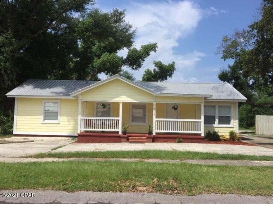 4/2 HOUSE ON A DOUBLE LOT (FENCED) EFFECTIVE YEAR BUILT 1970'. ***ZONED FOR UP TO 5 LIVING UNITS*** BEING USED AS A DUPLEX WITH A MONTHLY INCOME OF $2000. ***EASILY CONVERTS BACK TO A SINGLE FAMILY 4/2 HOUSE. METAL ROOF, HUGE FRONT PORCH. NEW KITCHEN COUNTERTOPS. NEW MAYTAG FRIDGE AND GAS STOVE. 1 BATHROOM WAS COMPLETELY REMODELED INCLUDING FLOORING, TUB AND PLUMBING. CENTRAL AC UNIT IS 3 YEARS OLD. EXTERIOR MAIN ELECTRIC SERVICE PANEL AND METER IS COMPLETELY NEW(2 YEARS). LARGE DETACHED RV CARPORT IS 20ft WIDE, 26ft LONG AND 20ft TALL (CAN FIT ANY BUS OR RV W/30 AMP SERVICE. DETACHED 20ft X 12ft METAL SHED INCLUDED. A CEMENT BLOCK 15ft x 12ft BUILDING WITH A NEW METAL ROOF IS LOCATED IN THE LARGE BACKYARD. LARGE INDOOR LAUNDRY ROOM AND OUTSIDE BBQ/PARTY WOOD DECK IS ACCESSIBLE TO BOTH UNITS LARGE CEMENT FRONT U DRIVEWAY AND HOUSE IS ACCESSIBLE VIA THE ALLEY WAY THROUGH THE BACKYARD FENCE GATES.