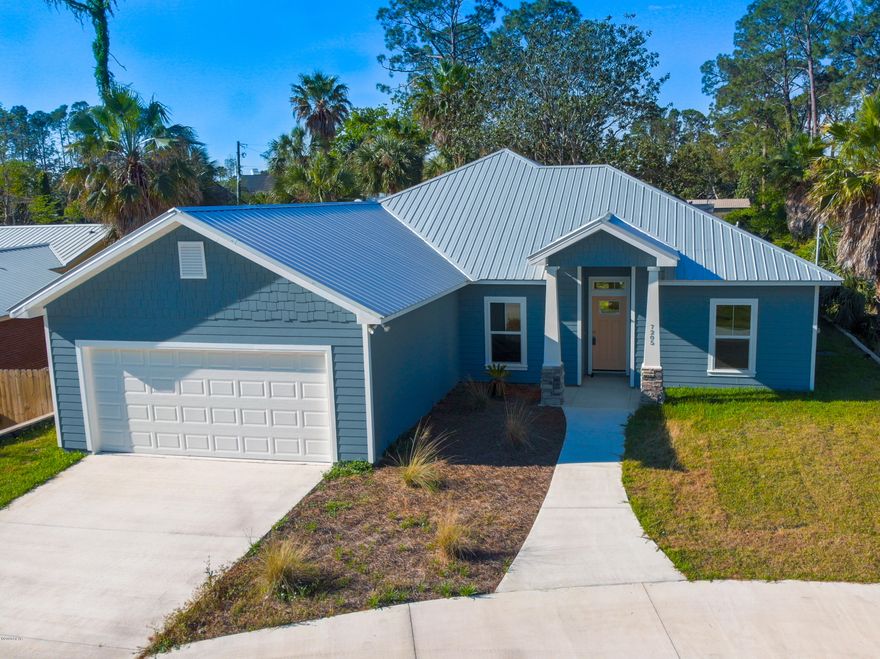 'CURRENTLY UNDER CONTRACT, SELLER ACCEPTING BACKUP OFFERS'. .Age, sq ft, lot and room sizes are approximate, please measure if important,  This new craftsman style home is complete and ready for you and your family.  It features 4 bedrooms, and 2 baths.  Metal roof and Hardie board siding, stone veneer columns compliment the front entrance,  Split bedroom plan, master bath features walk-in shower, double vanity, walk-in closet and granite counter tops.  10' ceilings in LR & DR. Beautiful kitchen with Black Stainless appliances.   Impact windows, fiberglass exterior doors.    Vinyl plank through out.  Back porch overlooks beautiful magnolia tree shaded lot.