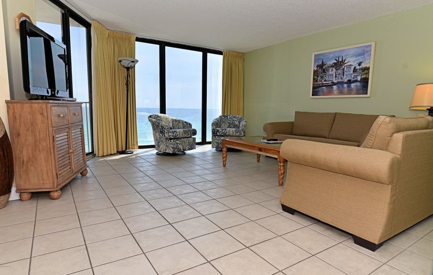 Highly sought after 2-Bed Deluxe. Large glass-front plan - living, dining, kitchen all on the Gulf. First one available all year! Kitchen has solid surface counters, updated cabinets and backsplash accent. Ceramic tile flooring throughout. Upgraded bath vanities, walk-in shower. New commercial grade sofa, loveseat and coastal barrel chairs. Private balcony with gorgeous beach view over heated Tower pool. Breathtaking sunsets set the tone for relaxing evenings. Offered furnished and Rental Ready! Exclusive Amenities, Lagoon Pool, Hot Tubs, Bar, Restaurant, Market. Golf Club, Tennis, Shuffleboard, Fitness Center, Salon Services. Kids Club, Activities, Splash Pad. Owner's pets welcome! Gated entrances. RV, Boat, Trailer, Electric Car parking. Walkable to dining, shopping, entertainment.