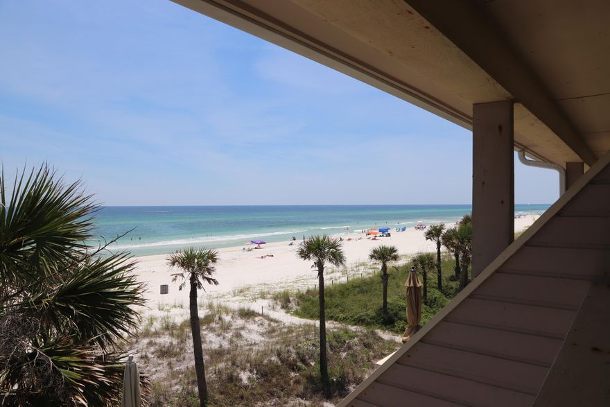 TRUE GULF-FRONT LIVING. Why buy a house 4 blocks off the beach on 30A when you can purchase Gulf-Front under $1M? SOLID CONCRETE CONSTRUCTION. Garage on the 1st floor. New windows and hardy plank siding installed on the Front Beach road side of the complex. GULF-FRONT LIVING ROOM and GULF-FRONT MASTER BEDROOM. Upgraded kitchen, Shiplap wood on ceilings.  Huge master bedroom. Shores Townhouses are way out on the west end of Panama City Beach, close to Hwy 30A. It feels like your own PRIVATE BEACH, very few people around.