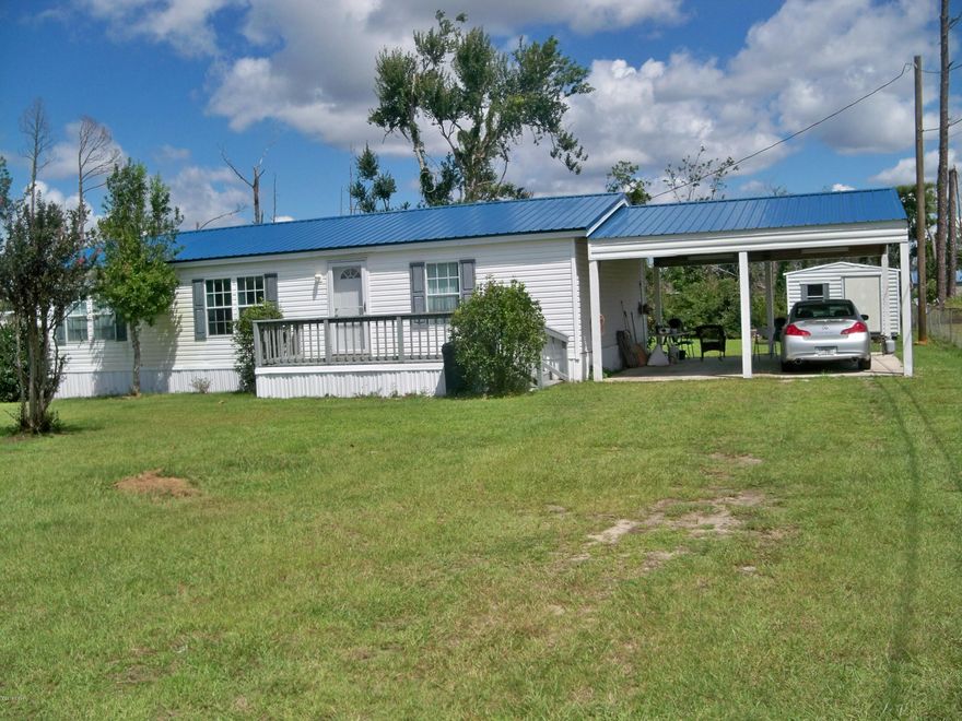 Great location.  Home features a large family room that is open to the kitchen and dining room.  The kitchen has good counter space, cabinets and a pantry.  The kitchen appliances convey.  The laundry room is located off the kitchen.  The split bedroom floor plan features a master bedroom large enough for a king size bed.  The master bath has a separate walk-in shower.  Carpet was replaced May 2019.  New metal roof 2019. The exterior features a 2 car carport, two decks (front and rear), storage shed (12' x 10') and a sprinkler system for the front yard.  Property is being sold as-is.