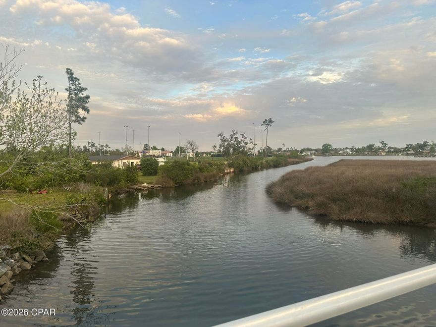 Waterfront in Callaway connects you to the Bay and Gulf. Enjoy the protected harbor in this great bayou location. A great place to build your new home and park your boat out back with access to the beautiful Bay and Gulf. 
One of the nicest parks in Bay County is across the street from this location with a boat launch, fishing, basketball courts, baseball, walking trails, volleyball and so much to enjoy every day. The John Gore Park is a large waterside park located at 432 Beulah Ave. It is a well-equipped recreational spot that offers a variety of amenities for different interests. It has so much history of Bay County and gives you 11 acres of land and fun activities to enjoy during park hours.