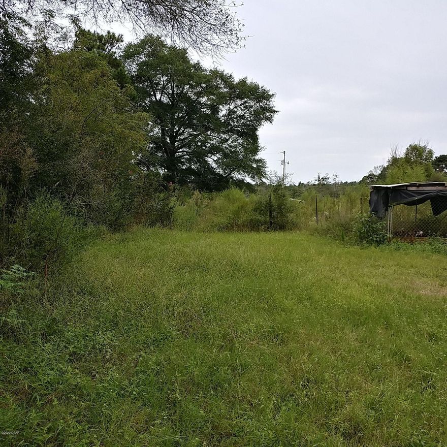 OWNER FINANCING OFFERED WITH $5000.00 DOWN !!  Cleared 1.65 acres of unrestricted property near the Alabama State Line in Westville, Florida.  Located on a paved road with Geneva, Alabama shopping only 10 minutes away.  There is a large 1600+ square foot barn on the property that needs repairs.  Property is gated and fenced.  There is a working well on the property but a septic tank will be needed. Seller is in the process of cleaning up the property and updated photos will be posted.