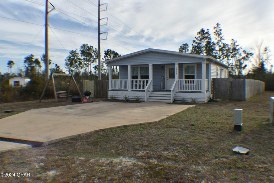 Cute Florida Cottage style home with full front porch. This home has 3 bedrooms, 2 full baths with standalone shower and a soaking tub in the main bath. Open floor plan with kitchen, dining room and living room for spacious living. Washer and dryer convey with sale. Fenced yard,  See Documents for Offer Instructions. Seller's Disclosure, Copy of Deed and Survey included. Great starter home at a very affordable price.