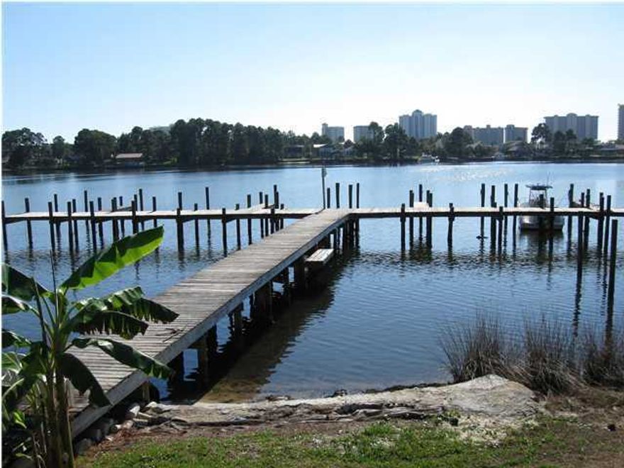 Waterfront complex on North Lagoon! This upstairs unit has a nice view of the pool.  One bedroom and one bath downstairs (level 2) and a loft bedroom upstairs (level 3). The boat slips are first come first serve and are available as long as the owner is on the property. Excellent vacation spot, first time purchase or retirement home. Enjoy the waterfront lifestyle for a very affordable price!