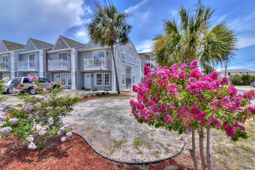 NO HOA FEES!  2 bedroom 2 1/2 bath End unit!!! This townhome is in immaculate condition! You can sit and relax under the sun sails in the backyard which has a privacy fence, and patio perfect for grilling out and small gatherings. Located just off Thomas drive across from Schooners(one of PCB's hot spots) and a short walk to the beach. This is the perfect location for vacation rentals and will definitely be a money maker! Comes mostly furnished and sleeps 8.      

New Roof in 2014 and new A/C in 2015.