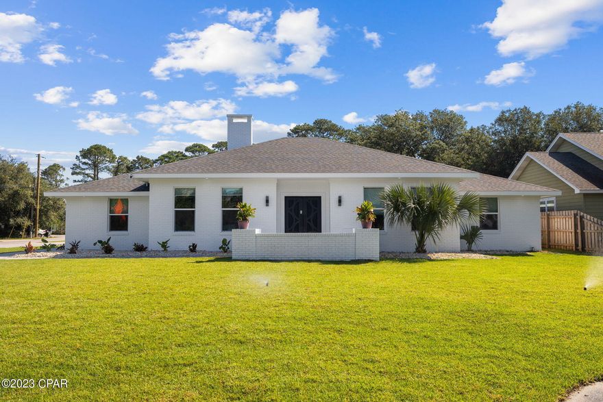 This property has sold! Discover similar listings by reaching out to us for an updated list of available properties that match your preferences.

This impressive remodel was just finished and is brand new throughout. Featuring an impressive outdoor space with a stunning pool, outdoor bar, fire pit and gazebo, this 4BR/4BA offers almost 1/2 acre to enjoy true Florida living. The owners spared no expense to update. Inside, you will find a fantastic kitchen with a huge island, TWO ranges and an incredible refrigerator. Beautiful floors run throughout the entire home and it has just been painted. All of the bathrooms include modern materials and there is a walk-in closet in the spacious master bath. This is a great home for people who like to entertain with entrances to the backyard from the kitchen, main living space and the master...and there is even a fireplace INSIDE. Back outside, there is space to store toys like boats, jet-skis or lawn equipment in a separate fenced area away. Located on a corner lot right around the corner from Thomas Drive and the beaches, this home is certainly one to put on your list to see.