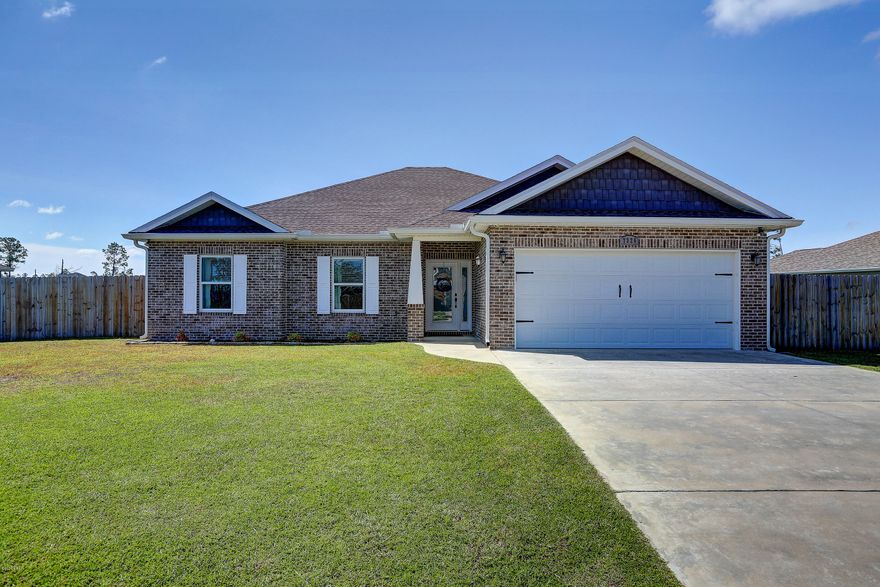 ''Best of Bay Builder'' Terry Kirkland Home. Waterfront 3 Bedroom 2.5 Bath Home! Open Floor Plan, 3 spacious bedrooms all with walk-in closets, Hardwood, Tile & carpet, neutral wall colors, trayed ceiling in the living room and Master Suite. The Kitchen comes complete with all stainless steel appliances, granite counter tops, hardwood cabinetry, breakfast bar, dining area & pantry! The master suite is 17x18 with lake view, large bathroom featuring double sinks, 5 ft separate shower, whirlpool tub, private potty room, His & Her Walk-in Closets. Separate Laundry Room, Spray Foam Insulation, Low E Windows, Alarm System, Energy Efficient Lights, wired for satellite, Storage Shed w Electric, Receptacles in eves for Christmas lights, outdoor shower, privacy fenced back yard... New Roof, New Gutters, New Vinyl Siding, New Flooring and Carpet. Outdoor shower, closed cell insulation throughout home. ENERGY EFFICIENT HOME! This home can easily be converted to Solar Power or a Smart House! All 240 V Circuits under slab, Conduits ran for Generator & Solar Power. Wired for Home Theater in Living room & Master Bedroom, Cat 5 ran to all rooms, Wired for cameras at front door and all 4 corners of the house, All bedrooms come with tv wall mounts. there are 2 washer and dryer hook-ups- 1 in Laundry room and another in garage. Master Bath is wired for a TV.