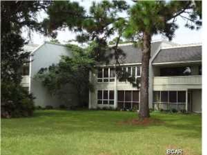 JUST REDUCED 5K! Don't miss out on this great home in sought after Bay Point community overlooking the beautiful greens of the Nicklaus Golf Course, ponds and a small view of the Bay. This unit does not come furnished and all items will be removed prior to closing. This is an Estate sale being sold ''as is''. Seller's are looking for offers. This unit has a storage closet to the right upon entry and all living space is on the second level. Two very nice sized bedrooms both overlooking the golf course. Walk in closets in both rooms and one room has two separate vanities and another storage closet. The living area features vaulted ceilings with fireplace and opens to an enclosed air-conditioned sun room overlooking the golf course....a perfect get-a-way spot or office/play room. A