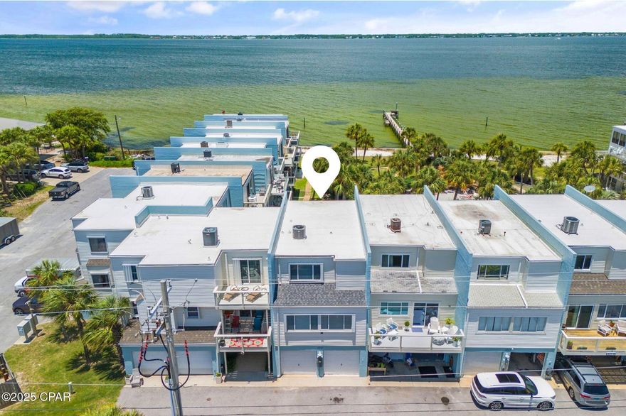Prominently positioned to showcase the stunning views of the bay throughout the unit, this stunning coastal retreat spans three distinct levels totaling 1,900 square feet. Upon initial entry, you're welcomed into into a spacious mother- in-law suite, currently configured as an art-studio, featuring sweeping views of Pensacola Bay, custom storage with beverage fridge, and smooth shiplap accented walls.

Upstairs, the main living and dining area offer stunning views of the surrounding topography and features a thoughtfully designed coastal color palette, tall ceilings, and beautiful tile flooring. A bay-front balcony beckons for outdoor gatherings, the perfect place to indulge in a morning cup of coffee, lunch or dinner, while taking in the ocean breezes and idyllic bay views.

The fully renovated kitchen is equipped a luxury café appliance suite, stunning quartz countertops coupled with a stunning coastal backsplash, warm wood tones and new fixtures. A guest suite, accessorized with two twin beds, desk and private-ensuite complete the 2nd level.

Ascending to the third level, the spacious, bay-facing primary suite is a true oasis, flooded with natural light and a private terrace expanding the full width of the unit, ideal for taking in the renowned hues of the Emerald Coast sunrise and sunsets. The spa-like ensuite features dual vanities with modern fixtures, white ship-lap walls, and a private water closet with bath. Just down the hall, the guest suite offers a queen size bed, views overlooking the surrounding greenery, and a private bath.

This rare, bay-front unit has been immaculately maintained and features tons of premium upgrades to include a newer HVAC (2020), Roof (2021), tankless water heater (2020), newly painted exterior, newly remodeled kitchen with all new appliances, newly painted interior, accent walls, cabinetry, and much more.


The low-density community of Bahia Paz townhomes is tucked away in the heart of Pensacola Beach and is located just a short 2-minute walk to the renowned Emerald Coast beaches. Guests and owners can enjoy stunning green spaces, a beautiful community pool and private bay-front dock, perfect for heading out on the water with a kayak or paddleboard for an afternoon adventure. Boaters will love the easy access to the Santa Rosa Sound, perfect for sunset cruises or fishing trips.

The culmination of luxury and exclusiveness creates a truly intimate setting while remaining geographically poised near all of the acclaimed dining and entertainment venues Pensacola Beach has to offer. This a true compelling opportunity for both full-time and second-home residents alike. Inquire today and start living the coastal lifestyle you deserve.