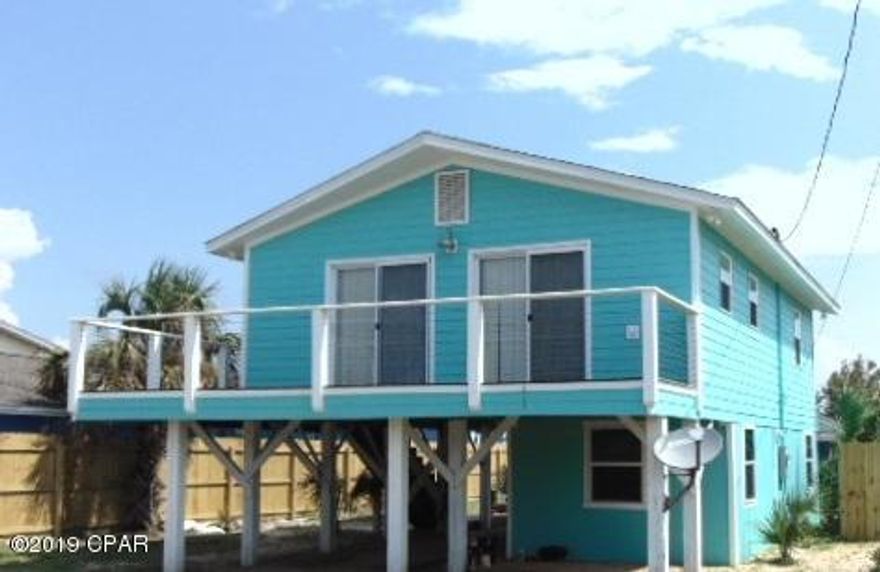 BEACH HOUSE- 3 bedroom, 1 bath home featuring open living/dining combo, recently updated cabinets and appliances, double sliding doors leading to balcony with view of the gulf. Large storage room located under the premises. Property is walking distance to the beach. Property is on septic system. 1 small dog under 20 lbs allowed ($250 pet deposit/$25 pet rent/$50 pet​​‌​​​​‌​‌​​​​‌​​‌​​​​‌‌ fee)