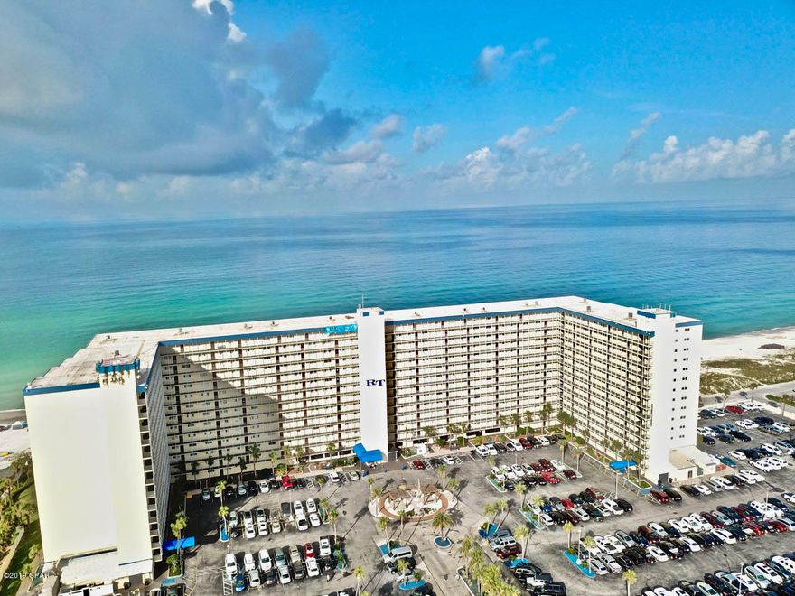 This immaculate condo is a must see! Located on the quiet end of PCB close to entertainment, St Andrews State Park, shopping and some of the best restaurants available. This unit has had major renovations, you will not find another like it. This end unit boast over 1,350 sq.ft of sprawling entertaining space. Highlights include, new windows, elegant light fixtures, porcelain tile floors that flow throughout this units open floor plan, additional sliding doors installed to the corner of the balcony so you can enjoy Gulf view and breathtaking sunsets from any part of the main living areas. The spacious kitchen with updated appliances, a breakfast bar, tons of cabinet and counter space is certain to bring out your inner chef. This unit has had the floor plan reshaped giving you ample living space and additional bathroom space. All of the furnishings are top of the line, from the real leather sleeper sofa to the tables and vanities. The amenities will keep you busy for hours on end including, a tiki bar, two gulf front pools, hot tub, lawn area, sun bathing deck, fitness center, game room, BBQ grills and more. This unit is a must see! call to schedule your showing today!