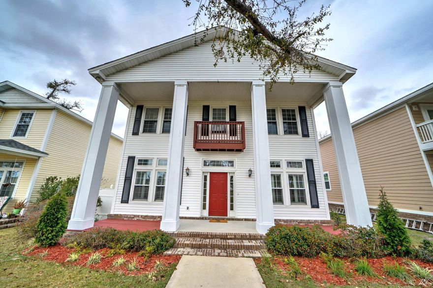 Charming 3 bed 2.5 bath in Riverside Park. The dramatic porch with large columns overlooks the courtyard and mile long sidewalks. The welcoming foyer leads to multiple living areas. There is a formal dining room with an entrance to the kitchen and a separate sitting room that could also be used as an office. The eat-in kitchen opens up to a den with a wood burning fireplace. The kitchen is equipped with stainless appliances, breakfast bar, and pantry. All bedrooms are housed upstairs with a 1/2 guest bath downstairs. The master suite is embellished with a huge tray ceiling, recessed lighting, carpet in the bedroom, and tile in the bathroom. The master bath has a soaking tub, separate shower, private toilet, double vanity and a large walk-in closet. This home boasts a large garage located at the back of the home with plenty of space for extra storage. There is also a beautiful brick courtyard off the den. White vinyl fencing encompasses the backyard for privacy. Riverside Park has great amenities including a pool, playground, fitness center, community building with a kitchen, a large picnic pavilion, and fishing dock. Riverside Park is a unique and welcoming family-friendly community.