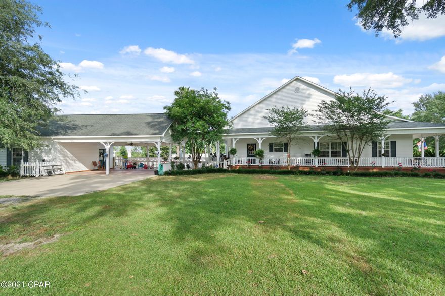 CURRENTLY UNDER CONTRACT SELLER ACCEPTING BACKUP OFFERS. This Country Beauty sits back off the rood and offers a beautiful tree line approach to the home. It is especially beautiful when all the white blossoms of the pear trees are blooming. The unique home has over 902 sqft. of open Covered porch that wraps around the home with plenty of Rocking Chairs to watch the birds and enjoy the zin. It offers, 600sqft finished carport, 504sqft extra storage. 3 Large BR's with full bath in each and walk-closets. Large private office. The Game room is a separate Bldg. could be Mother-in-law area. 32'x16' in ground Private Pool. 12'x12' patio area. A Work shop and a cover Area for Travel RV. Separate garden building. 2- 80Gal. Water Heaters, Duel AC. The acreage has lush landscaping.