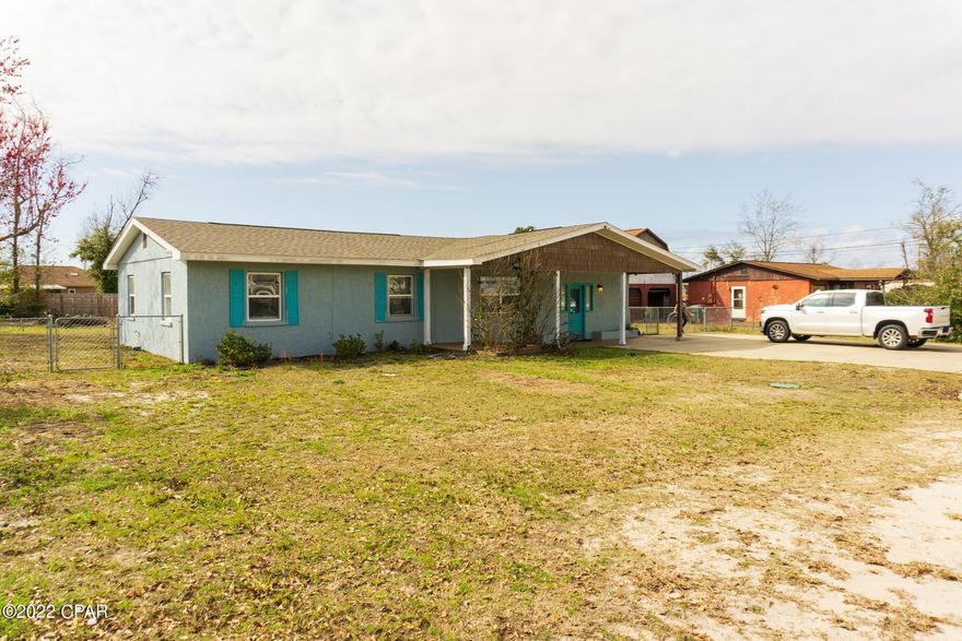 Lynn Haven 3/2 with solid stucco on block construction.  Floors have all been update with NO carpet.  Plenty of space with 1430 square feet sitting on a 1/3 acre corner lot. New roof installed in 2019. Master bath has been prepped for the next owner's touch.  Paint, cabinets, and appliances are recently updated.  Home still needs a little work, but is the best deal in Lynn Haven.  Has a couple of out buildings and dog house.