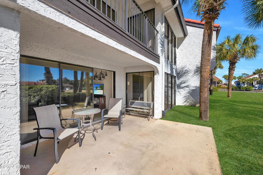 The HEATED POOL entrance is right off the back porch! *NEW HVAC *This ground floor 3-bedroom 3-baths is an END unit at Edgewater Golf Villas Beach Resort with premium location in the complex, making it an excellent rental investment. The spacious living room has sliding glass doors that open up to an extended patio that overlooks the pool, the primary bedroom windows overlook the pond AND the pool and also has sliding glass door access to the patio. The second bedroom suite has a sliding glass door that opens up to the front of the building conveniently located next to the pickleball courts.
 
Edgewater Beach and Golf Resort Complex is pet friendly and offers several amenities including FREE GOLF at a Par-3 executive 9-hole golf course plus full pro shop and equipment rental available. 11-Pools (all seasonally heated with the exception of the main pool), 6 reflecting ponds, 4 whirlpool spas and a Polynesian-style lagoon pool, which offers an open free-form surface area and elaborate system of waterfalls and islands within the pool itself, sun decks, beach access, restaurant, room service, salon, spa services, poolside bar, tram rides available to the beach. Over 5 dining options including private Gulf-front dining at Ocean's Bar and Grill, Starbucks Coffee Shop, Pizza shop, Blender's frozen drinks and Edgie's Corner Market Ocean's Bar & Grill that also offers ice cream shop, kids club features special events, splash pad, activities calendar. All Information is deemed to be reliable, but is not guaranteed, buyer to verify if important.
