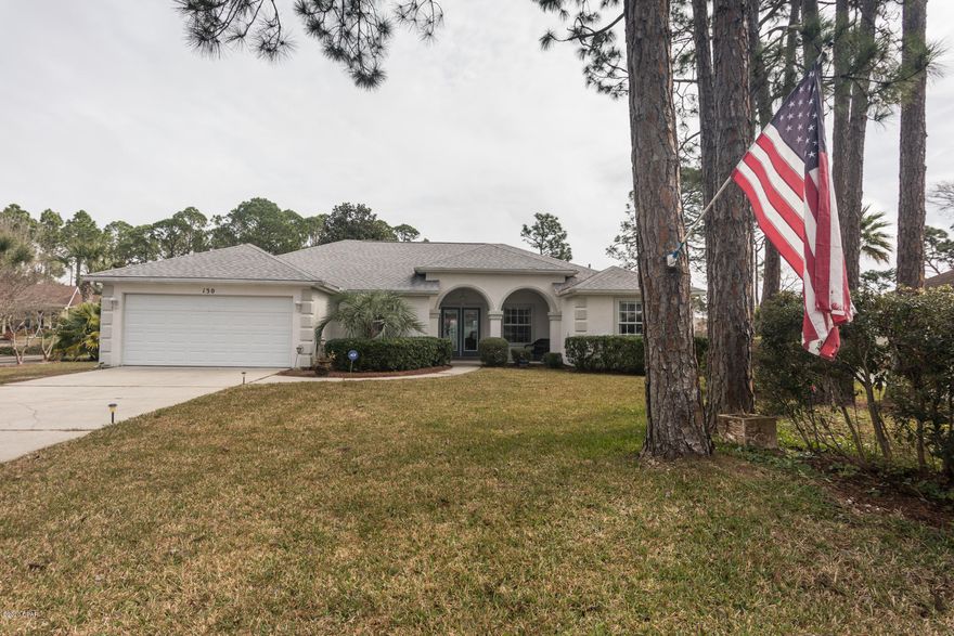 Look no more, this home is for you!  This gem is snuggled in Grand Lagoon Shores, close to schools, Navy base and Grand Lagoon.  Well kept 3 bedroom, 2 bathroom,  Florida sunroom, AND inground pool. Plenty of parking with large driveway for when you are entertaining by the refreshing pool, plus 2 car garage.   Livingroom has a pool view, fully equipped  kitchen with breakfast nook, separate dining room, master bedroom with trey ceilings. This home has easy maintenance with laminated and ceramic floors  and carpet in one additional bedroom. Laundry room has washer/dryer with cabinets for storage and access to the garage. 2 Storage sheds.  Roof 2017  This home is a must see and won't last long. All dimensions are approx.