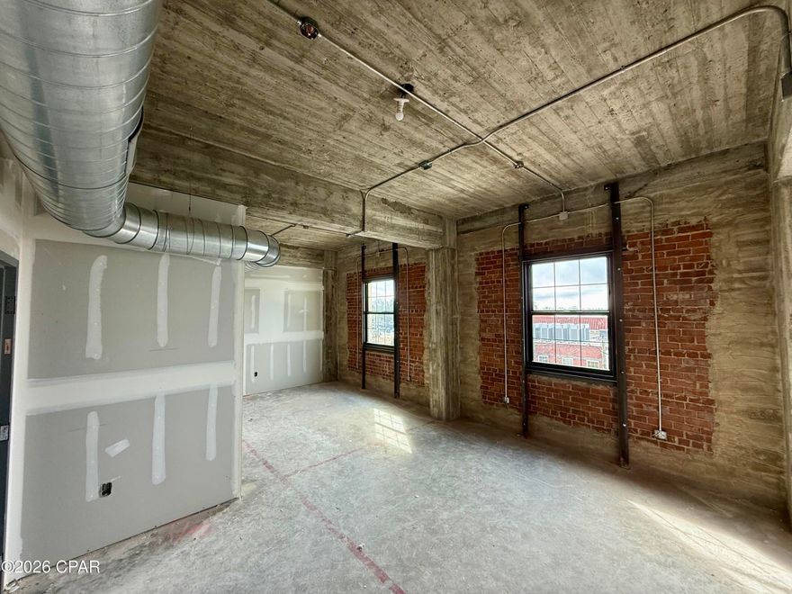 *The Mashburn Building | Historic Downtown Panama City*

Experience a new chapter in Historic Downtown Panama City with The Mashburn Building--a signature four-story development designed to elevate urban living while honoring the character of downtown. This landmark project brings together modern luxury, industrial design, and the energy of a walkable city lifestyle.

The third and fourth floors will feature distinctive industrial-style residential lofts, thoughtfully designed for both investors and those seeking upscale downtown living. Each residence showcases nearly 12-foot ceilings, polished concrete floors, and open, contemporary layouts that highlight the authentic character of loft-style spaces.

Construction is currently underway, offering a rare opportunity to secure a residence in one of the area's most exciting revitalization projects, with an anticipated completion in April 2026.

Step outside and enjoy immediate access to the vibrant atmosphere of Harrison Avenue, where boutique shops, art galleries, coffee houses, breweries, and entertainment venues create a dynamic downtown experience just steps from your door.

Blending timeless architecture with modern design and community-centered living, The Mashburn Building is poised to become one of Downtown Panama City's most sought-after addresses.

Reserve your loft today.

*Disclaimer:* The renderings provided are for illustrative purposes only and may not represent the final product. Certain features, finishes, and details shown may include optional upgrades that are not included in the standard offering. Actual specifications, materials, and layouts may vary. Please consult with the builder or sales representative for complete details regarding available options and standard features.