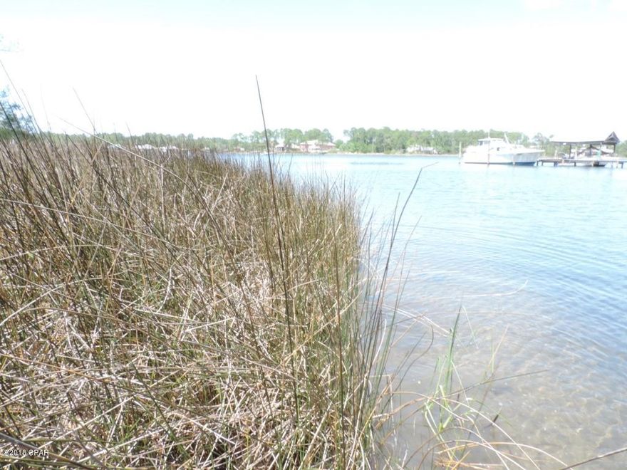 Waterfront lot located on Cooks Bayou with access to East bay and the Gulf. Lots of large old growth trees. come build your dream home on this beautiful over half acre lot. If you want more land, the lot next to it can be purchased together. Buy both lots for $120k. All sizes and measurements are approximate if important please verify.