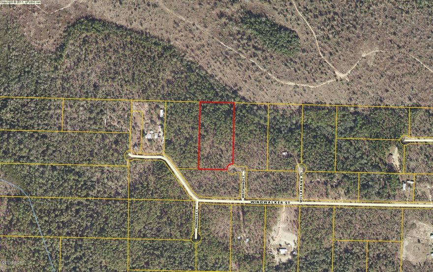 This 4.71 acre parcel is waiting for you. Where Florida's natural beauty,numerous lakes and rivers and the peace and quiet of the country surround you. Build your family home here, a country get-a-way, or buy it for an investment for the future generations in your family. Just minutes from the famous Econfina Springs, Sunny Hills golf course, and the world's most beautiful beaches. Northwest Florida has some of the best fishing on the planet. There are many great fishing holes near this property. Also enjoy the solitude of being at the end of the cul-de-sac. This 4+ acres can be yours if you respond today.