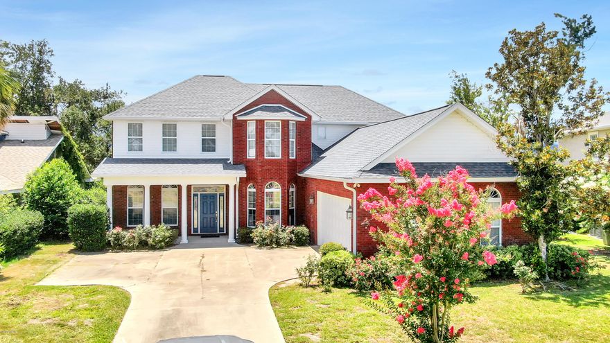 CURRENTLY UNDER CONTRACT, SELLER ACCEPTING BACKUP OFFERS This fantastic home in the always-popular Panama Country Club neighborhood is now available! Offering three bedrooms, three and a half baths, living room, great room, dining room, office/hobby room and large loft in over 3300 square feet of living space, there is something here for everyone. The home is located on the golf course with peaceful views out of the rear screened porch. It is also directly across from North Bay  with water views from many of the rooms. The spacious master bedroom is on the first floor, features a tray ceiling and access to the screened porch. The master bath boasts double vanities, a large walk-in shower, Jacuzzi tub and large walk-in closet. The upstairs bedrooms each have their own bath and one bath is a jack and jill bath with access to the large loft.There are two fireplaces in the home, one in the living room and one in the great room. The dining room, living room and great room have wood floors and the great room has built-in bookshelves and cabinets. The eat-in kitchen is welcoming and bright with lots of counter space and cabinets and a pantry. The oversize side-entry garage has additional parking and a door for a golf cart and two large storage closets. The large laundry room has a deep wash sink, counter, cabinets, washer and dryer and small refrigerator. The neighborhood is convenient to shopping, boating, beaches, golf, parks and so much more. Call your Realtor for your personal tour today.