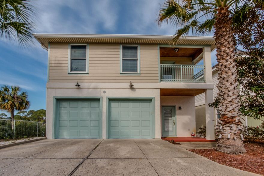 WATERFRONT home on Grand Lagoon. Built in 2001 and in excellent condition. Over 1800 square feet of living area. This RARE find features wonderful waterfront views from the back porch and master bedroom balcony. Open floor plan with 3 bedrooms/2 and a half baths, tile floors, two car garage and large bedrooms. This home is ready to move into. Community clubhouse and pool. The location of this home makes it the perfect place to live in year-round or use as a vacation rental. The Grand Lagoon is perfect for fishing, paddle boarding, kayaking or just enjoying the beautiful water view. Bonita Point owners will have the 1st priority in a covered rented boat slip located at the neighborhood boat dock. This opportunity is few and far between, so do not miss the chance to view this home before it's gone!

Age, dimensions and square footage are approximate. Buyer should verify if important.