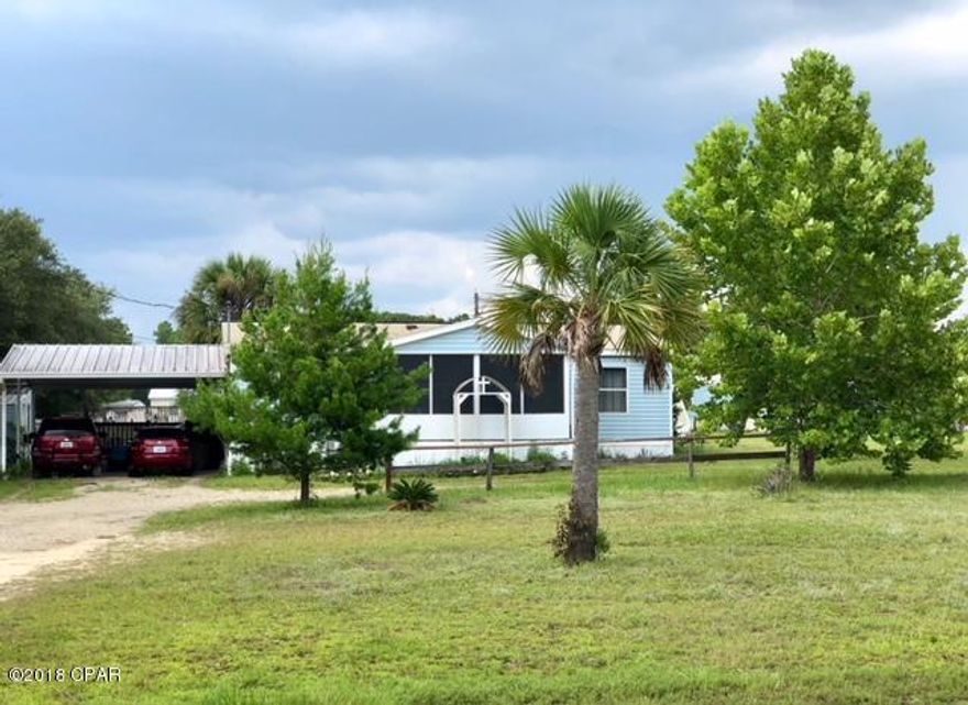 PRICE REDUCTION Enjoy the peace and quiet of country living yet still be minutes from town. Located 2 mi from Deane Bozeman. This 3 BD/ 2BA has a great layout w/ lots of room. Nice size kitchen has Pantry with the laundry room a few feet away. Washer and Dryer incl. Hardwood floors in two additional bedrooms and carpet in Master. Master has walk in closet and a newly updated master bath. This home has Separate living room and Family room which gives families room to spread out and be comfortable. Front porch is a Florida room and can be heated and cooled and back porch is a nice sized deck. Above ground pool is functional but needs some TLC. Also included with the house is 3 Storage buildings and a Chicken/Dog pen with concrete floor. Large two car carport attached to back deck.