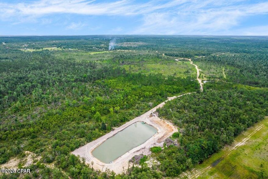 Beautiful 20-acre tract located in Calhoun County, offering a rare combination of usable land and a large, scenic pond. This property provides the perfect setting for a private homestead or recreational retreat. The pond offers excellent opportunities for fishing, wildlife viewing, or simply enjoying the peaceful surroundings.

The acreage features a mix of open and wooded areas, ideal for hunting, horseback riding, or building your dream home with plenty of privacy. Abundant wildlife and natural beauty make this property a true North Florida escape, while still offering convenient access to nearby towns and amenities.

Whether you're looking for land to build, invest, or enjoy recreationally, this property checks all the boxes.