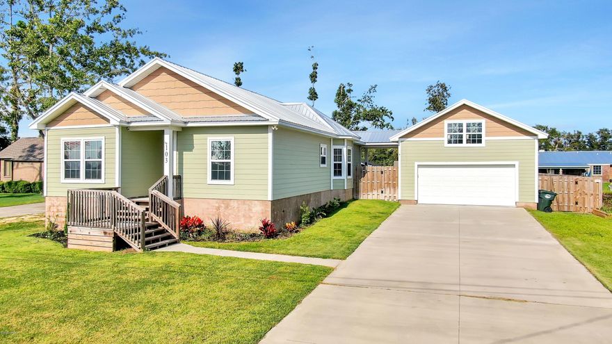 Stunning craftsman style home with detached garage, This home has spacious open floor plan, with kitchen Island/breakfast bar,Wood looking plank floors,Stainless steel appliances, modern lighting and colors, Spacious bedrooms, super large fenced in yard,sprinkler system, large back patio to sit and watch the kids play. Home has propane tankless water heater, electric stove. Call your Realtor to see this home today won't last long