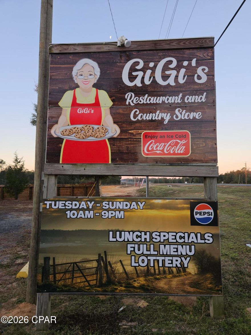 Welcome to Gigi's, a family owned restaurant that serves up good country cooking in a friendly atmosphere. Conveniently located on Highway 77, this is more than a restaurant with a beer & wine license, other streams of income include a U-Haul rental location, Florida Lotto, a retail convenience area and offers consignment items from locals. There is also a bar with a big screen TV to watch sports. Included in the sale is a 9x6 walk-in cooler, all freezers and refrigerators, all of the modern kitchen equipment, along with tables, chairs, bar stools, and booths.  There are 2 coolers and 5 freezers. The new construction homes in neighboring Sunny Hills are quickly selling which is providing more potential nearby customers as well as growing traffic along Highway 77. There are 2 storage buildings outside and both will remain. Sunny Hills water service is about $150 monthly, and there is a private septic system and a grease trap. There are about 26 parking spaces. The kitchen has a tankless water heater and bathrooms have a traditional electric water heater.