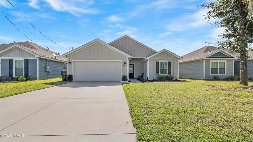 CURRENTLY UNDER CONTRACT, SELLER ACCEPTING BACKUP OFFERS Check out this beautiful 4bd/2bath home located in the heart of Lynn Haven! This home showcases all the modern finishes with split bedroom, open concept floorplan. This home features neutral warm tones throughout, with craftsman style accents. The kitchen showcases great natural light, with shaker-style cabinetry, stainless steel appliances with deep farmhouse style sink, classic subway tile backsplash, complete with modern quartz countertops. The dining area features shiplap accent with barn door that provides access to your laundry and additional storage space. Master bedroom is just off the kitchen and includes a walk-in closet with double-vanity ensuite and gorgeous tiled shower. The remaining three bedrooms can be found in the The spacious, fully-fenced backyard provides plenty of space for backyard entertainment or future pool! No HOA and just a short drive to top-rated schools, shopping, dining and local activities and entertainment. Don't miss your chance to preview this gorgeous home today! All sizes/measurements are approximate; please verify if important!