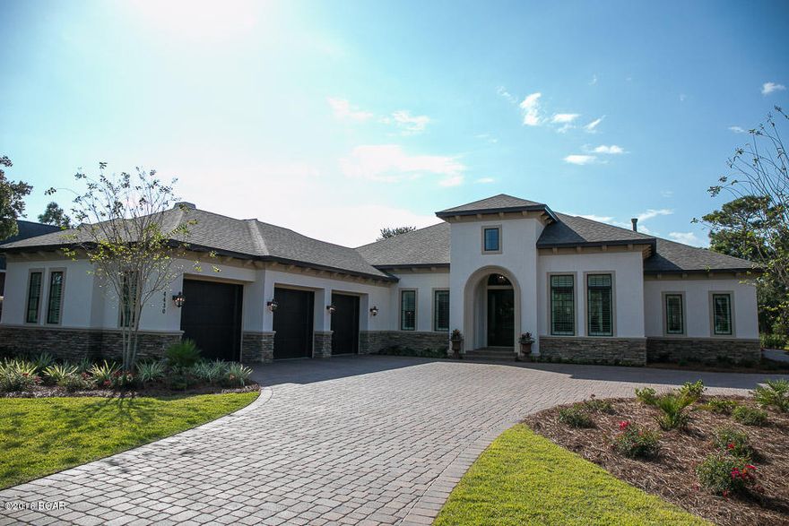 The excitement of this newly custom-built ''Arthur Rutenberg'' designed residence built by Signature Homes(Bobby Fisher) begins immediately overlooking the #11 fairway,in the highly coveted,gated golf community of Kelly Plantation. Spacious, open floor plan, this 3 Bed/3.5 Bath home is equipped with many custom upgrades (see documents tab). The excitement of this custom designed residence begins immediately as you walk across ''Hickory Pecan'' flooring in weathered saddle(color), leading you to the gorgeous backyard through disappearing hurricane proof ''Arthur Rutenburg signature'' sliding glass doors. The entire backyard has a hurricane proof (150 MPH)safe screened enclosure to enjoy your summer kitchen, breathtaking views of the golf course and pool with listed features below: Heat pump, Ozone, chemical & salt water treatment system, floor jet system, water fall with spray jets, LED lights, and Swim Jets added for endless pool feature. The Master bath has breathtaking Marble counter tops, jetted soaking tub, and the incredible shower boasts 6 spa jets and a Rain shower head. Additional extras include Cat 5&HDMI, commercial grade Wi-Fi throughout, LED smart TV with Apple TV installed on ALL TV's, upgraded amplifier and internet switching system with IPad control for sound system in the great room & pool. Other features include: Heated tile floors throughout ,Hurricane rated glass and doors, 3 zone central HVAC system, Culligan water softener, 2 Rinai tank less water heaters, Hidden Pantry & closet, Fire alarm system, Trash compactor and ice maker. Pool is under warranty till Aug 2018. House is under builders warranty until Aug 2017.