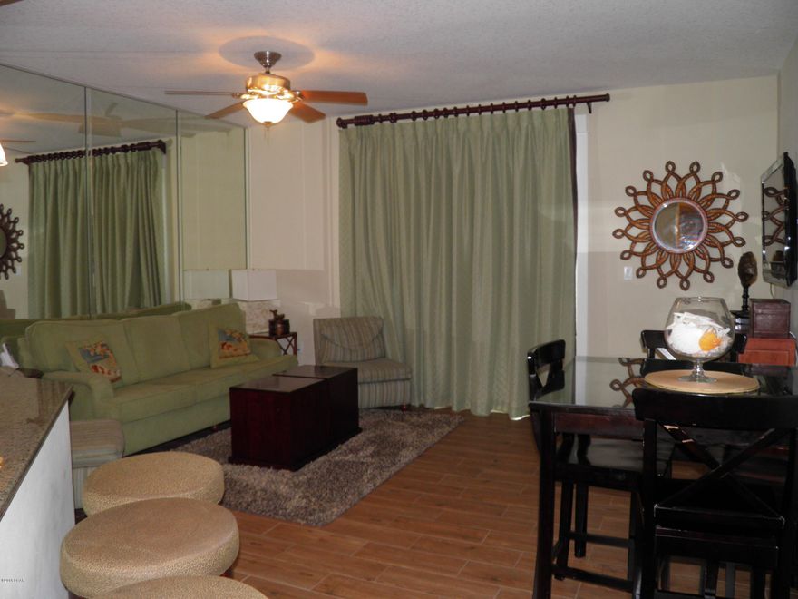 Price reduced $10,000!! 1bed 2bath in Luxury Grand Panama Beach Resort is one of the most desired Resorts on the Beach. This 1 bed 2 bath with bunk condo has all the upgrades. Tile, granite counter tops, Tile hardwood in family room, and a great view of our beautiful Gulf of Mexico. This unit is a rental machine and always in demand. Resort has 2 pools, tiki bars, fitness facility, conference center, Both towers have been recently painted look brand new.It is priced for a quick sale a must see!!