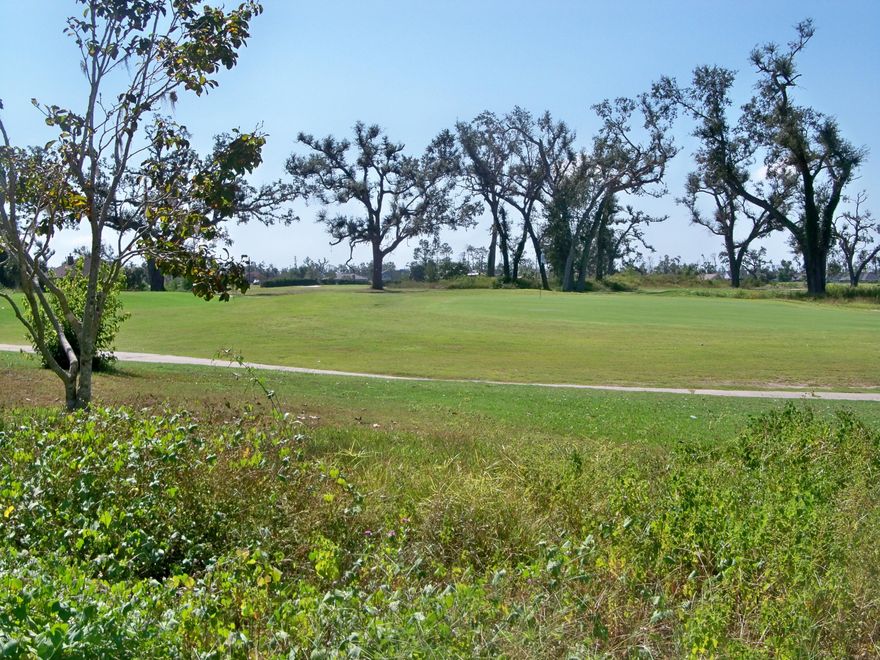 A beautiful townhouse lot overlooking the 12th green of the Panama City Country Club.  The town home was damaged by Hurricane Michael and has been demolished, with the slab foundation remaining.  The seller had new floor plans completed and available.  There is an easement between this lot and the neighboring lot providing additional space and privacy.   Great opportunity to build your home in this community.