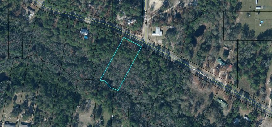 Completed mobile home pad! Here's your opportunity to own 1 acre of creek front  property already prepped for your home.  Located just outside of Wewahitchka, this property is conveniently located close to Apalachicola and Chipola Rivers.  Fishing galore!  Build your dream home or use for a mobile home weekend getaway. Opportunities like this don't pop up often and this is priced for quick sell.