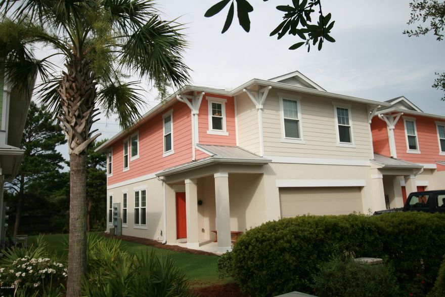 Price Reduction on this RARE End Unit TownHome in Whisper Dunes!!! These do not come on the Market very often! Aprox. 1900 Sq. Ft. 3 Beds 2 1/2 Baths, Beautiful Granite countertops, SS appliances, including a brand new LG Fridge and a Stove with warming drawer. Two Car Garage! Extra area upstairs, currently being used as an Office. End Unit, so lots of windows and natural light. Tile Floors downstairs, solid poured concrete wall construction. Lots of upgrades including wiring for surround sound and alarm. Energy efficient, and wind mitigation report included. Whisper Dunes is located on the quite and desirable West End, close to Pier Park,30A and the Beaches. If sizes and details are important to you, please verify.