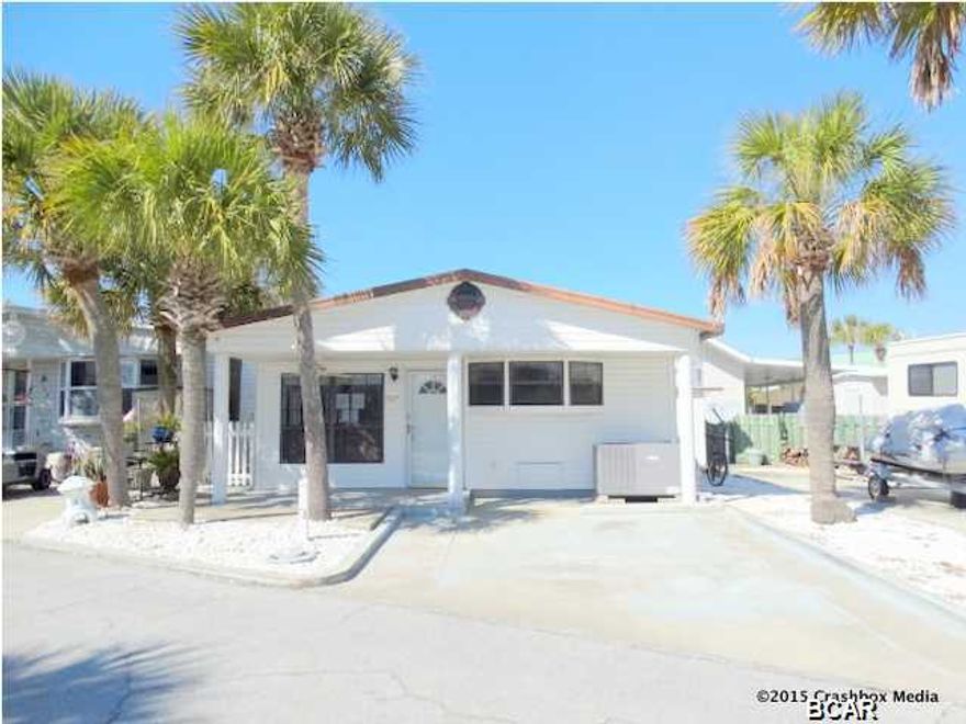 Live the Florida Lifestyle! Enjoy all resort style amenities, private access to sugar white beaches and convenience of a golf cart distance ride to the adjacent St. Andrews State Park. This split-level home has carpet and tile flooring and plenty of windows. The master suite has a large bathroom with double vanity, shower, and access to the indoor laundry room. The eat-in kitchen has a bay window with window seat, breakfast bar, and lovely cabinetry. The guest bedroom and bathroom are behind the kitchen so your guests will enjoy some privacy while visiting you at Florida's hottest beach destination. Don't miss out! One of the best prices in a very desirable community. All information is approximate and should be verified. Sold as is.