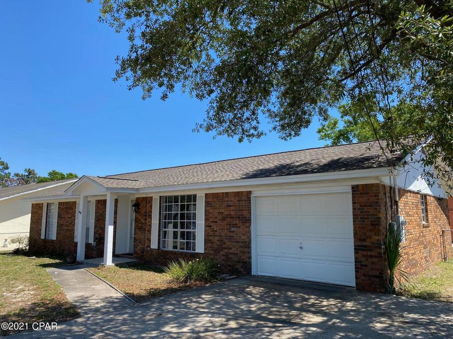 CURRENTLY UNDER CONTRACT, SELLER ACCEPTING BACKUP OFFERS' Panama City Beach:  Just west of Hwy 79.  3 bedroom, 2 bath, 1355 SF ranch style brick home with 1 car garage and detached storage building on a large fenced 75x120 lot..