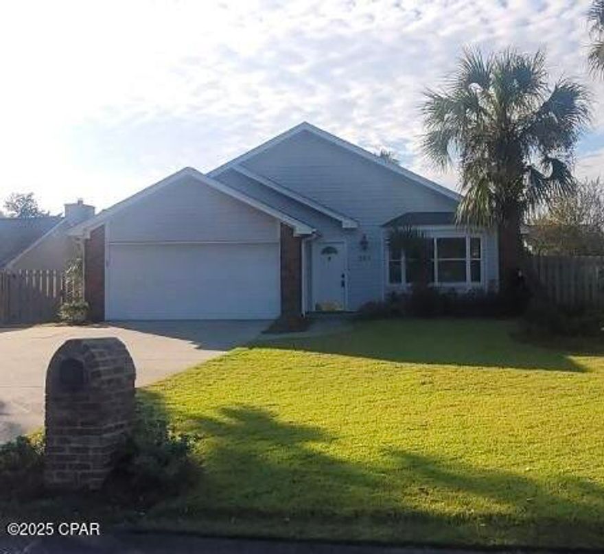 'CURRENTLY UNDER CONTRACT, SELLER WILL CONSIDER BACKUP OFFERS- Welcome to this beautifully remodeled 3-bedroom, 2-bath home offering modern comfort just one block from Grand Lagoon and only half a mile to the Gulf of Mexico. With 1,400 square feet of thoughtfully updated living space, this home blends coastal charm with contemporary style.

Step inside to an open, airy layout featuring brand-new finishes throughout. The living area is warm and inviting with a beautifully updated fireplace—perfect for cozy evenings after a day on the water. The kitchen shines with updated cabinetry, sleek countertops, and stainless appliances, all flowing seamlessly into the main living space. Both bathrooms have been fully renovated with fresh, modern fixtures.

The fenced backyard provides the perfect space for privacy, pets, or outdoor gatherings, while the two-car garage offers convenience and extra storage. Whether you're looking for a full-time residence, a vacation home, or an investment property, this home checks every box.