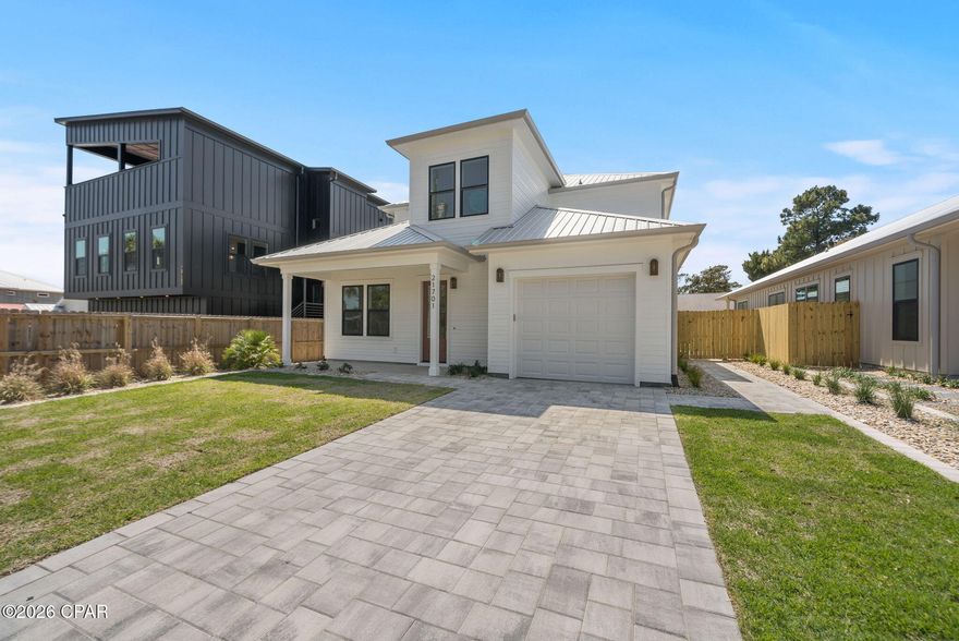 Luxury 2025 new construction near the Gulf with private pool, STR allowed

Walk to Panama City Beach's sugar‑white sand from this brand‑new 2025 luxury home, thoughtfully built for both everyday living and strong short‑term rental performance. The 4‑bed, 3.5‑bath layout includes two main‑level suites with private bathrooms, perfect for guests, multigenerational households, or maximizing vacation rental occupancy.

Open floor plan with upscale coastal finishes: durable luxury vinyl plank flooring, tall accent ceilings, and a bright loft that works as extra lounge, bunk room, media space, or game area. The chef's kitchen boasts custom cabinets, quartz counters, a gas range with designer hood, and a large island for gathering. Spa‑style baths, abundant natural light, and clean modern details complete the interior.

Outdoor living is a highlight: private saltwater pool, covered patio, and room for year‑round relaxation or entertaining after a day on the beach. Built with 2x6 exterior framing and a metal roof, this home was designed for durability, efficiency, and long‑term peace of mind.

Located in a golf‑cart‑friendly neighborhood near Pier Park, Highway 30A, Camp Helen State Park, Topgolf, and Dolly Parton's Pirate Voyage—right in the heart of PCB's top attractions. With short‑term rentals permitted, it's a compelling choice as an income‑producing vacation home, second home, or primary residence in Panama City Beach.