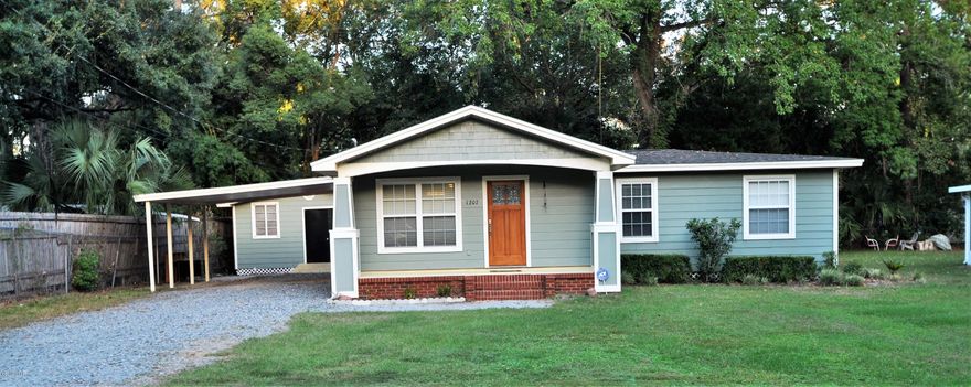 What a find!! Awesome 3 bedroom Florida Cottage in the heart of Lynn Haven. This home has so many additions - laminate floors, heated and cooled sun room, nice size bedrooms, and a huge master bathroom with walk-in closet!  This home also has an 800 sq ft additional building that has air and water to it - you could make an awesome man cave, a mother in law suite, a workshop, a place for your band to practice...what's YOUR idea? You can make it happen here!  This home is move in ready. call NOW for your private viewing.Mosley High School was named one of the top 50 High Schools in America.  Lots of Tyndall AFB workers live in this area. You are surrounded by shopping, restaurants, night life, the bay, parks, and so much more!!! not in flood. Roof age is 6-8 years old.