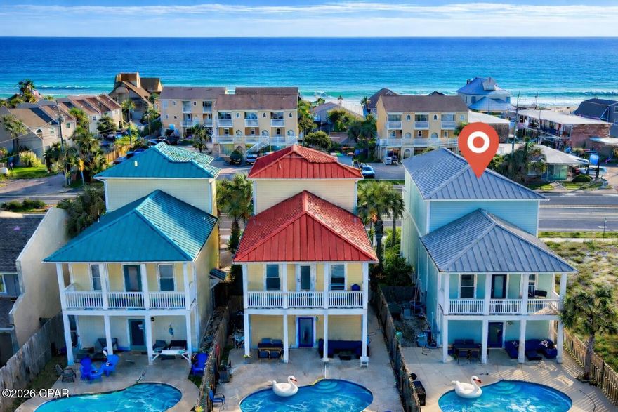 Luxury 3-Story GULF VIEW BEACH HOME with Heated Saltwater Pool | STR | No HOA | No Flood | Turnkey | Vacation-Lifestyle Ready 

$$$  INVESTORS $$$  HIGH-YIELD INCOME POTENTIAL for this one or both properties!

Attention Investors, Beach & Pool Lovers!  This 3-story Retreat is fully furnished, turnkey, and short-term rental ready with NO HOA or Flood.  Just steps from the Emerald Beach, sand, local dining, attractions and Rick Seltzer Park, this property offers a rare blend of luxury living and strong rental potential.

Featuring 4 bedrooms including a bonus bunk/wet bar/game room, 3 ensuite baths & 2 half baths, the home comfortably sleeps 14 guests (or up to 29 when purchased with the side-by-side ''sister'' home for sale). 

Guests will love the multiple balconies with Gulf Views, private heated saltwater pool, outdoor shower, 2 grills, and matching patio & dining sets — an entertaining masterpiece.

Inside, enjoy an open-concept main level with living, dining, kitchen & laundry room featuring stainless appliances, and LVP floors.  

The primary poolside 1st master bedroom with double vanity en-suite bath and private, large walk-in closet with a twin bunk are on the 1st floor.  

On the 2nd floor, you'll find 2 bedrooms. The 2nd master with double vanity en-suite bath, private balcony & sitting area and the 3rd bedroom with 2 queens, double vanity en-suite Bath + private balcony await.  

The 3rd floor offers the 4th, including bonus room & Gulf View balcony, bunks, queen bed, wet bar, and arcade games.

With 10' ceilings, LVP & Hardwood floors, Hurricane Windows, Hardie siding, Metal Roof, and parking for 4 vehicles + golf cart, this home was designed for both comfort and durability.  Steps from dining, marinas, and attractions—this is a prime investment and luxury retreat in one!  An Entertaining & Vacation MASTERPIECE! 

$$$  INVESTORS $$$  HIGH-YIELD INCOME POTENTIAL for this one or both properties!

BONUS:   The sister property next door (also for sale) sleeps 15.   Together, both homes host 29 guests total, each with identical layouts, pools, and furnishings.   

Unmatched portfolio or multi-home investor package opportunity!

Schedule your showing today!

GRI:  Rental Revenue for 2024 & 2025 are available upon request.