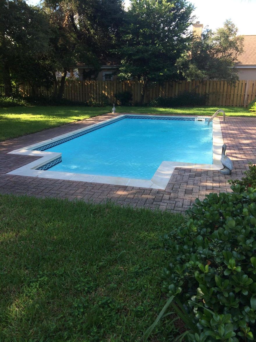 Beautifully updated 3 bedroom, 2 bath Palm Bay pool home! Back yard is fenced for maximum privacy. Exterior of home was repainted in 2016, and brand new water heater just a few weeks old. Kitchen and bathrooms were renovated and include granite countertops, newer appliances, custom tiled backsplash, and gorgeous wood cabinetry. Living room area includes floor to ceiling built ins, fireplace and a bar area. Master bathroom is like a mini spa! This home is perfect for all! Empty nesters, retirees or a big family. Plenty of space for everyone. And you will love the spacious backyard and inviting pool that can be accessed from both living room and master bedroom. All info is approximate and should be verified by buyers if important.